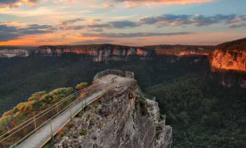 Early morning skies over Pulpit Rock Lookout a multi tiered lookout that descends from the main escarpment onto a sliver of rock that juts out into the Grose Valley. Amazing 180 degree views.   Location Blackheath Blue Mountains Australia